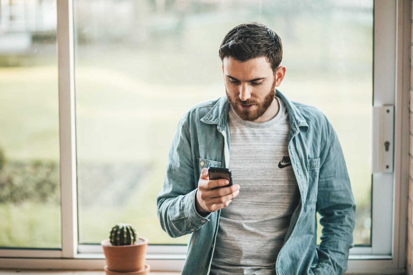 Person making a phone call to enquire about addiction treatment