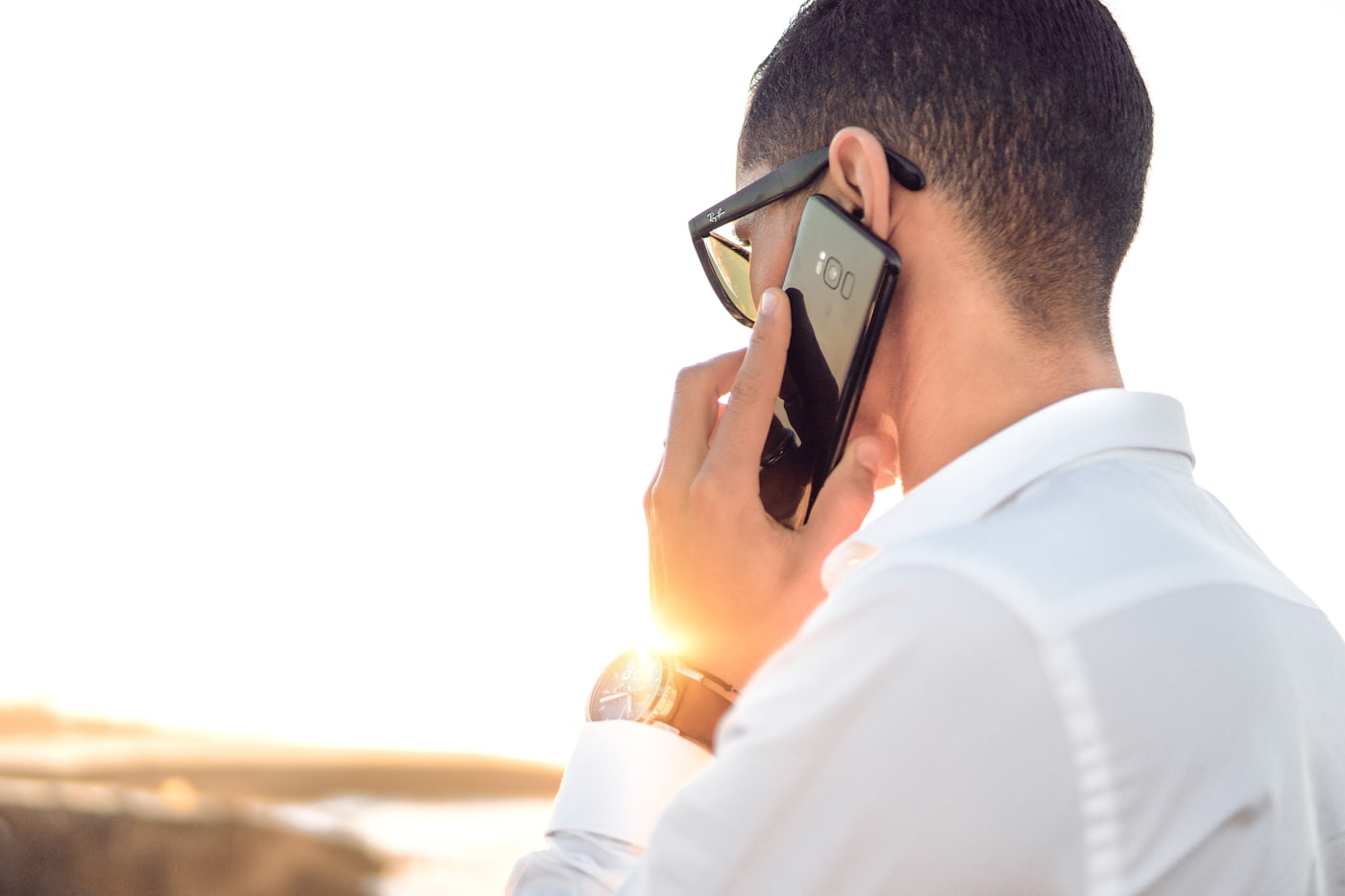 Person making a supportive phone call to an addiction helpline for help