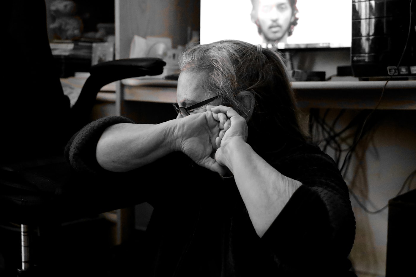 Person calling a confidential drug and alcohol helpline for advice
