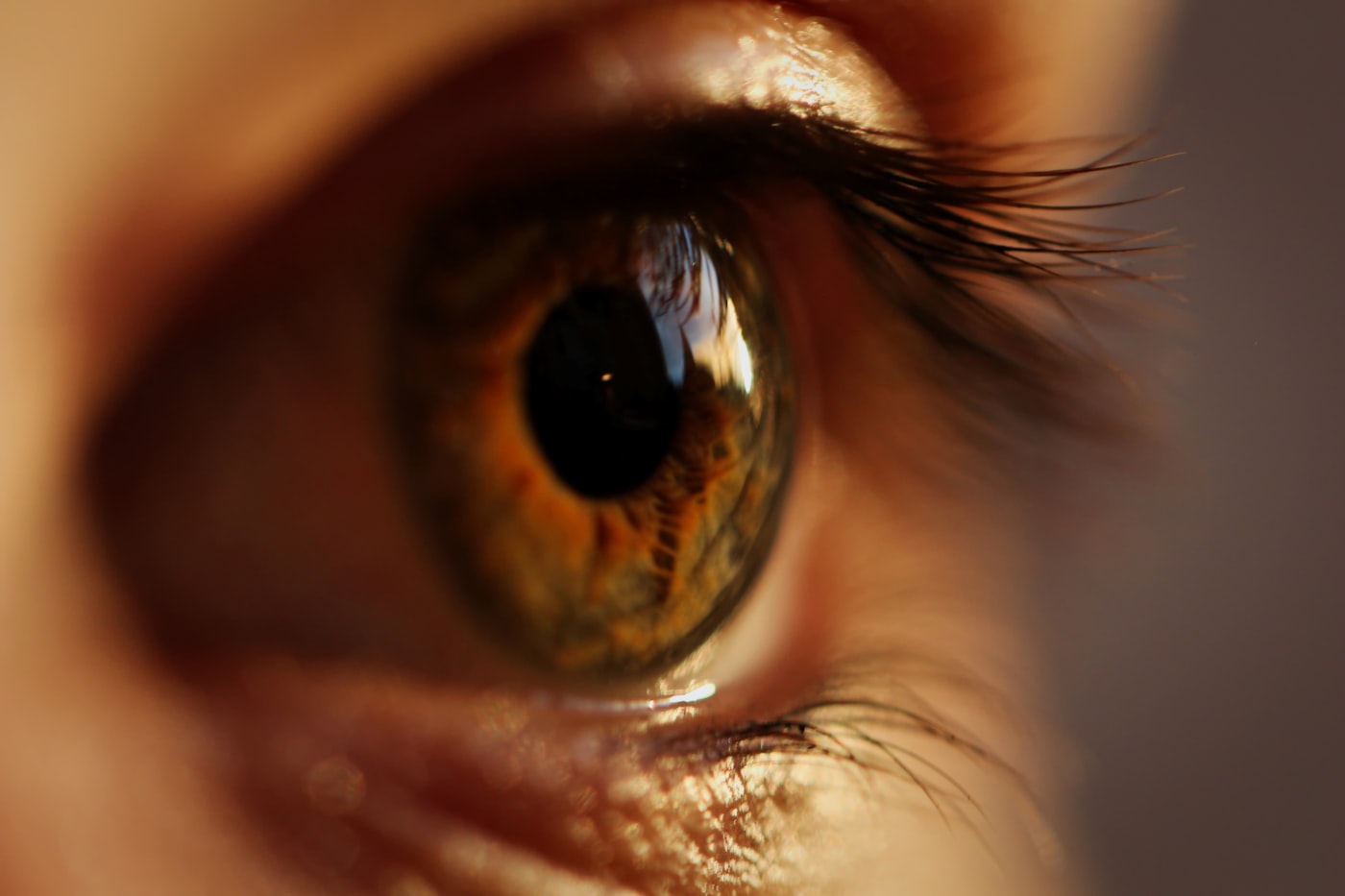 Close up of bloodshot tired eyes, a possible physical sign of drug use