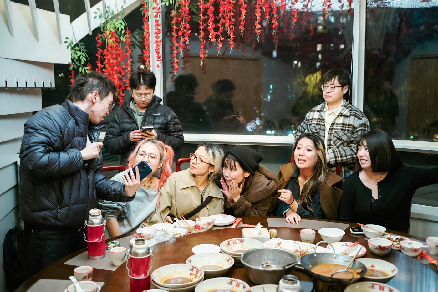 Friends drinking socially at a table illustrating moderate versus risky drinking