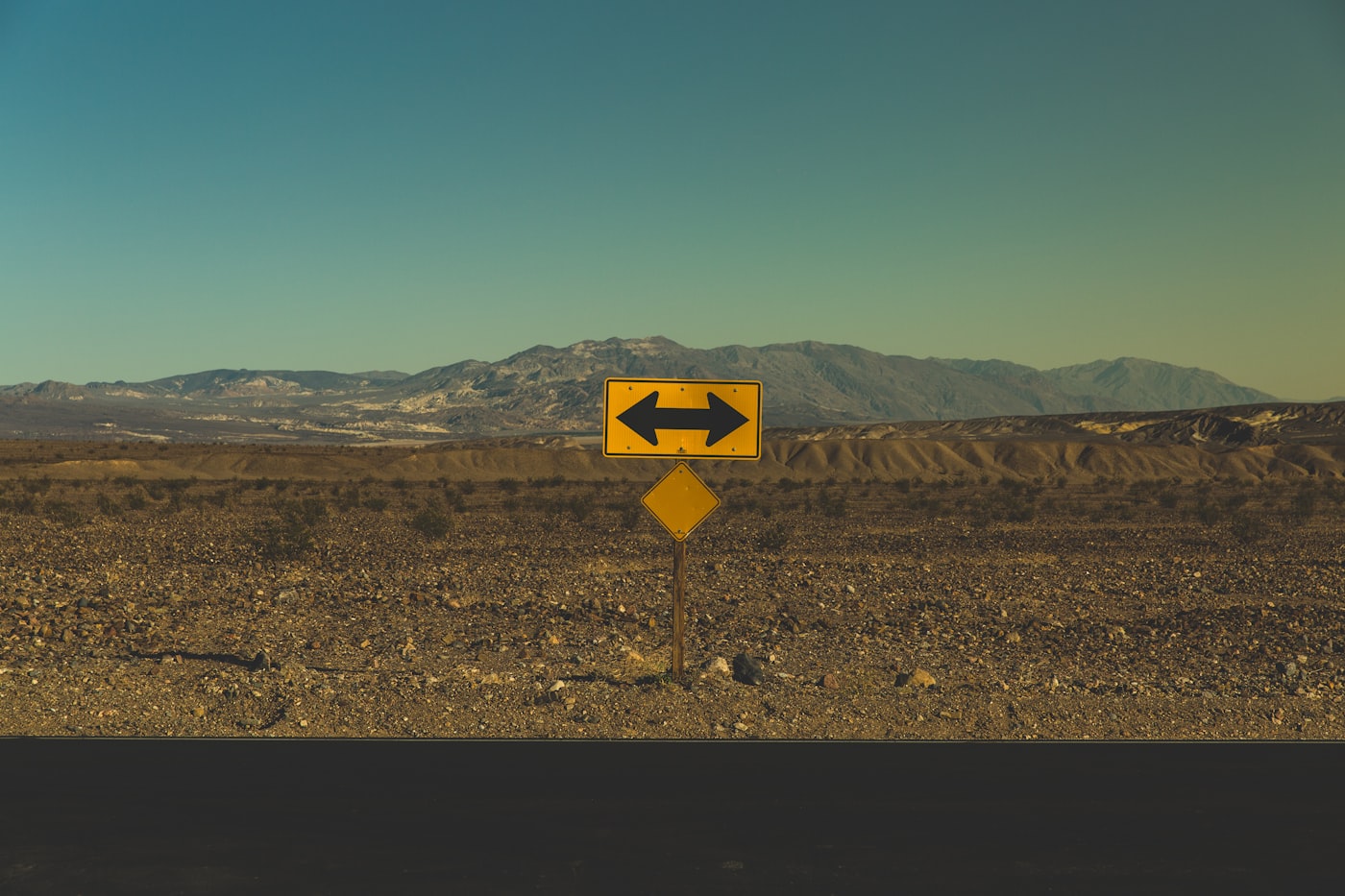 Signpost pointing in two directions representing two separate SPARC addresses