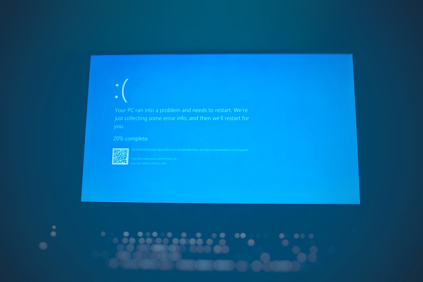 Laptop showing a broken link error representing an outdated website address